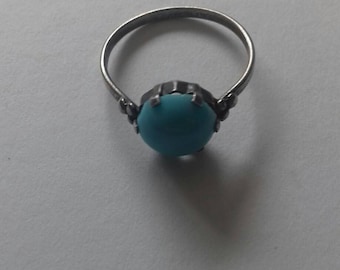 Vintage ring with light blue stone.