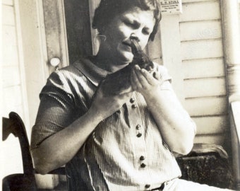 vintage photo 1922 Woman Holds Little Baby Bunny Rabbit in her Hands on Porch