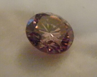 loose pinkish purple moissanite .79 ct brilliant cut round 6.0mm