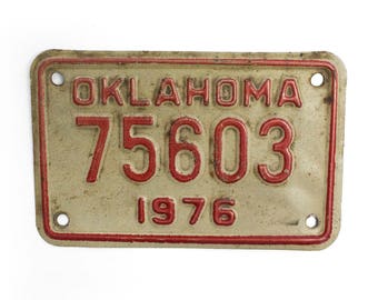 1976 Oklahoma Motorcycle License Plate - White And Red Vintage Used Bike License Plate (77-BO-LP-0129)