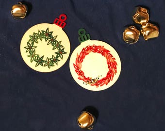 Handprinted Wooden Ornaments Decorated with Wreaths