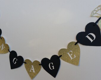 Black and gold glitter engagement banner. Engagement party decoration. Engaged bunting, garland. Engagement hearts