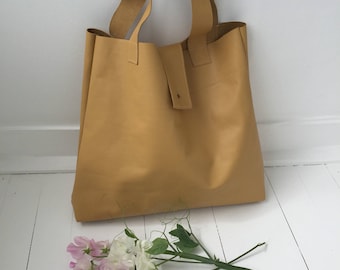 Vanilla, simple leather tote bag.
