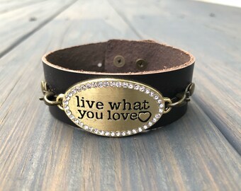 Brown leather bracelet with live what you love tag