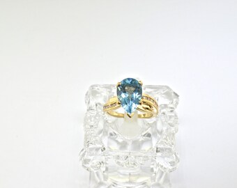 14k Blue Topaz And Diamond Ring. Size 4.5