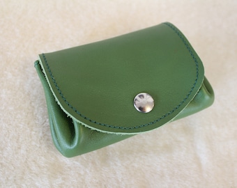 Green leather wallet. wallet; leather wallet. Green purse