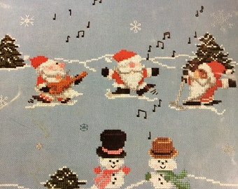 Merry Ho Ho counted cross stitch pattern book