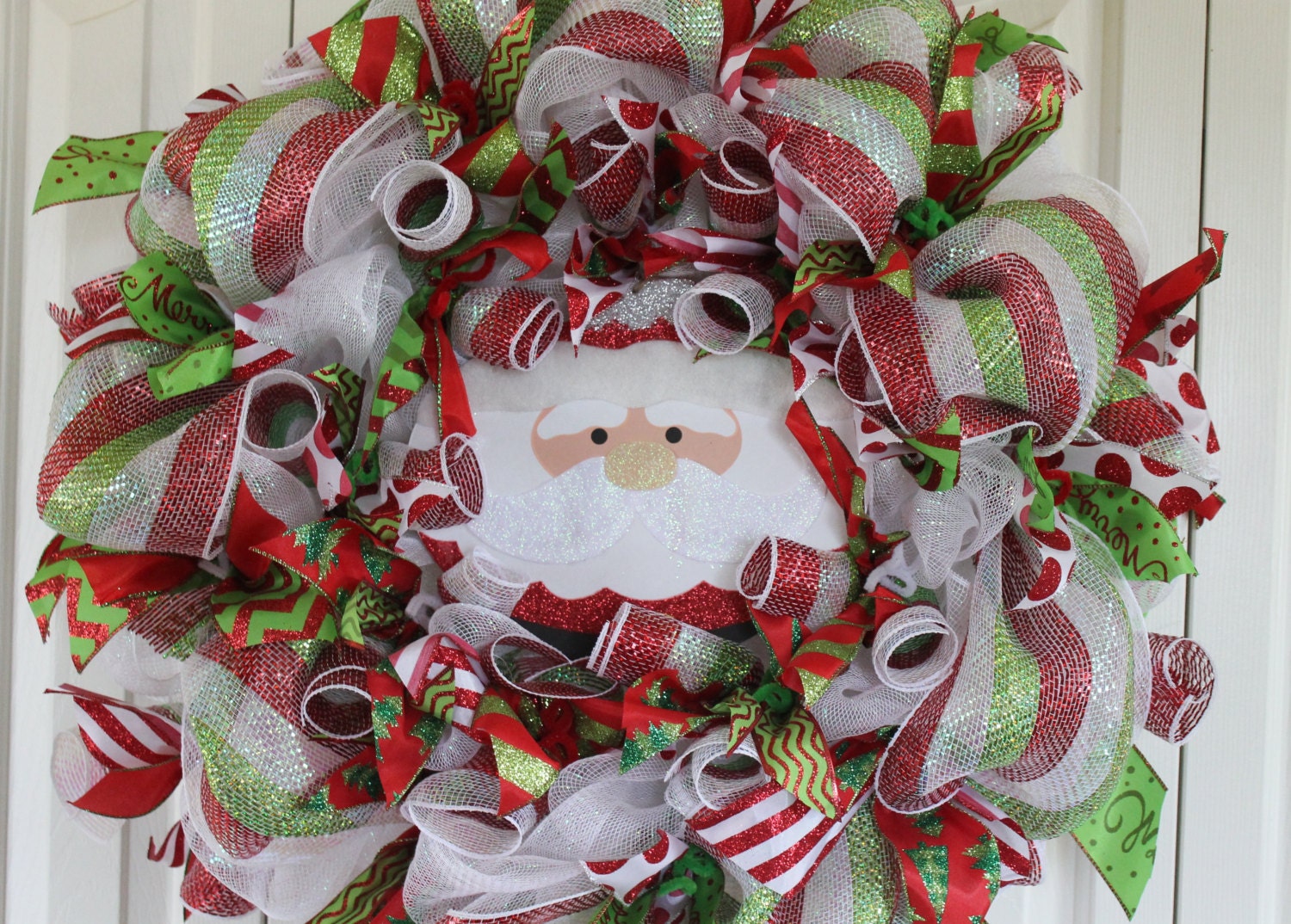 Christmas Deco Mesh Santa Wreath. Deco Mesh ribbon wreath.