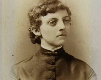 Gertrude - Victorian cabinet card photograph - sepia portrait of a dark haired woman with a wonderful character face - Baltimore US studio