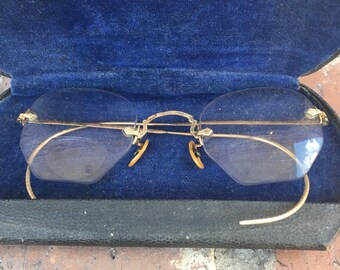 Vintage Bausch and Lomb wrap around 12 karat gold filled bifocal glasses with case