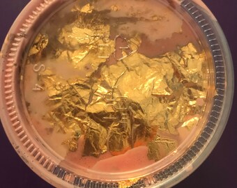 Shimmery pink slime with gold foil on top