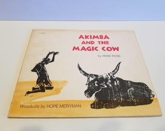 Akimba and the Magic Cow, By Anne Rose, Woodcuts by Hope Meryman, Copyright 1976, Published by Scholastic Book Services