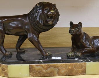 A French Art Deco bronze of a Lion and Lioness 1930
