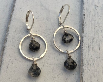 Sterling silver hoops with rutilated quartz.