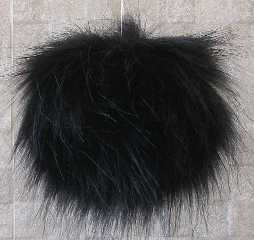 black fur pompom black fur pompom