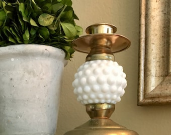 Brass and hobnail milk glass candle holder
