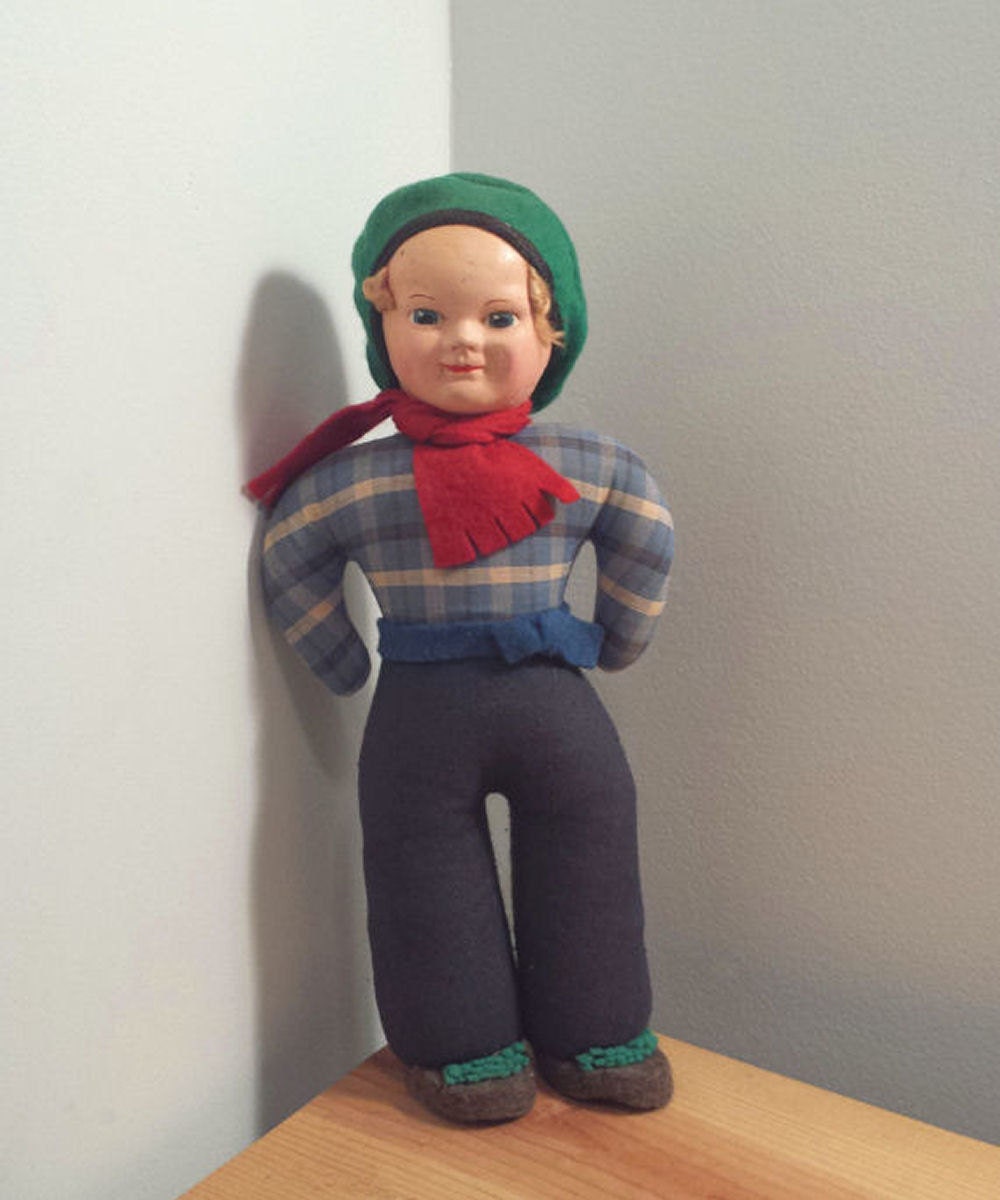 stuffed boy doll