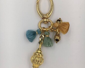 Gold keychain with Mappini and charms