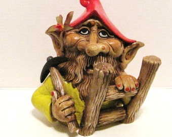 Ceramic Troll Ready for Gardening, 13 inches tall.