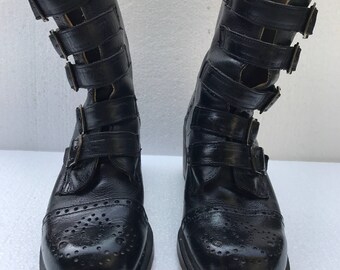 Vintage 1990s Doc Marten Boots. Black Leather, Chunky Heels, Five Buckles at Front. Brogue Perforated Detailing . UK Size 4, US size 6.