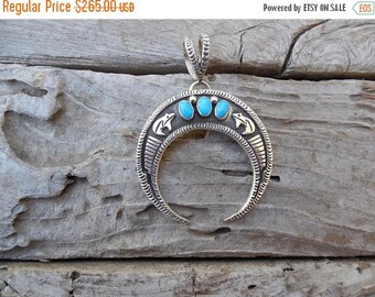 ON SALE beautiful turquoise naja handmade and signed in sterling silver, by a Navajo silversmith