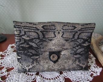 Fancy canvas pouch: black, gold, bronze.