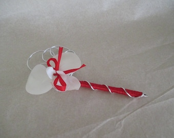 Red and white wedding guest book pen