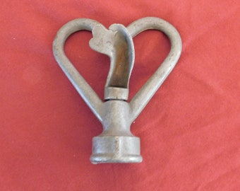 Antique cast aluminum water sprinkler