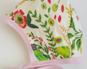 flower pilot hat by Little Lapsi. Baby hat with ties. hearing aid hat.