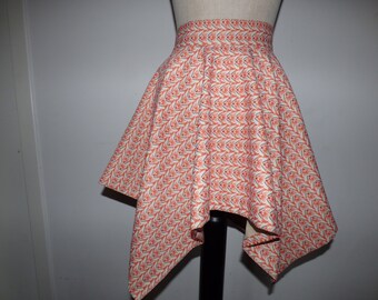 Wheeled skirt with four-pointed hem.