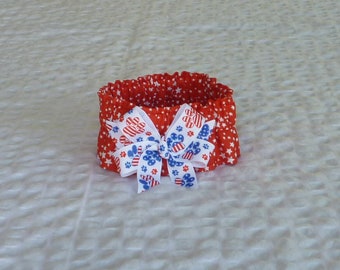 Dog Ruffle Collar, Pet Bandana - Starburst on Red Patriotic Dog Scrunchie Collar with patriotic paws bow - Size S: 12" to 14" neck
