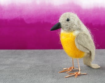 Small needle felted bird ornament.