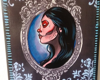 Day of the dead mounted print on wood. Hand embellished with acrylic paint. 9x12 hand painted details