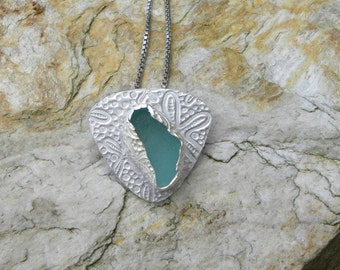 genuine aqua sea glass sterling silver pendant with patterned bezel
