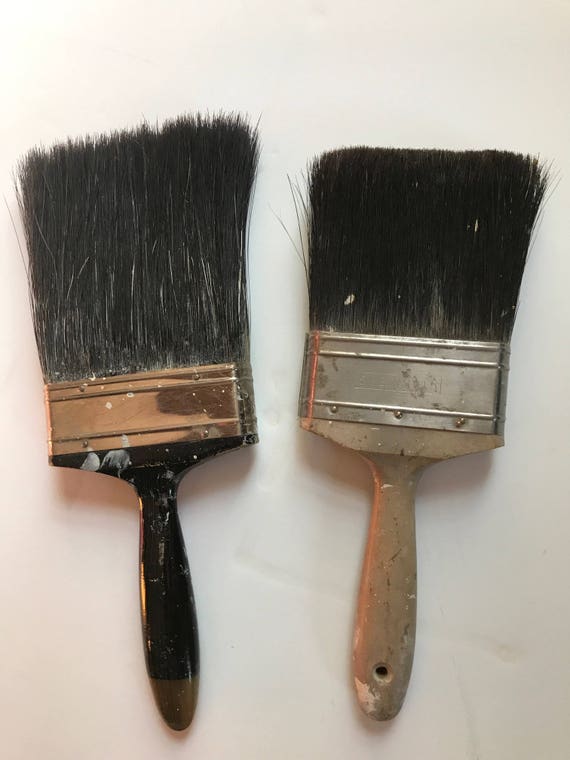 pair of vintage wide paint brushes in good useable condition from