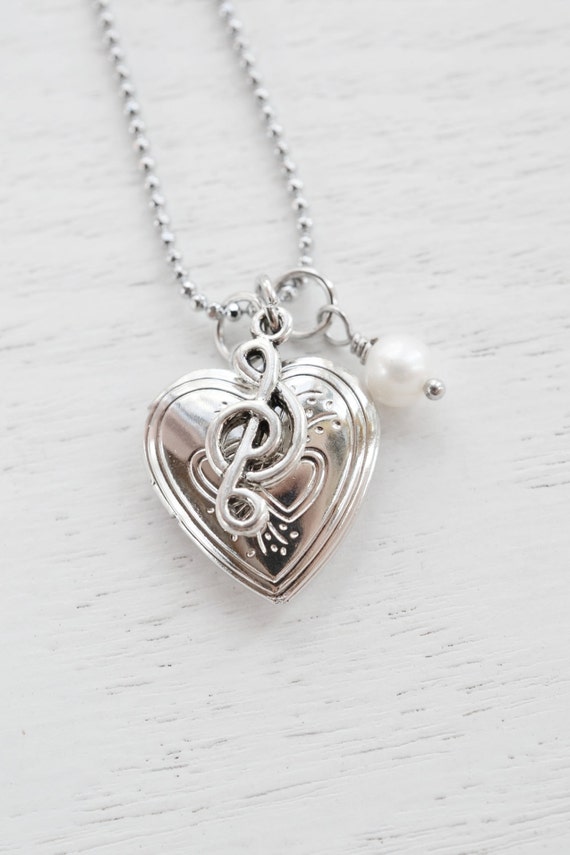 Items similar to Silver Heart Locket Musical Charm Necklace,Silver
