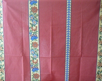 Original red background has polka dots and strips of 3 different designs, cotton fabric.