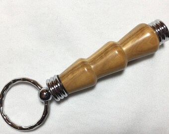 Secret Compartment Keychain, choose from gold or chrome, various woods. Waterproof; hides pills, needles, paper money.