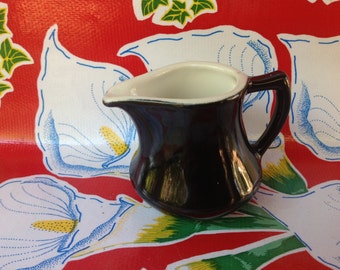 Vintage ceramic black restaurant ware creamer