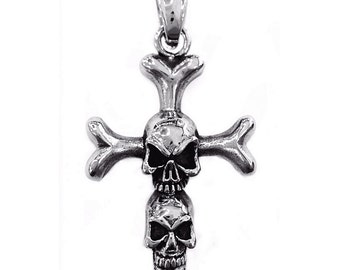 Cross pendant with skulls made of steel