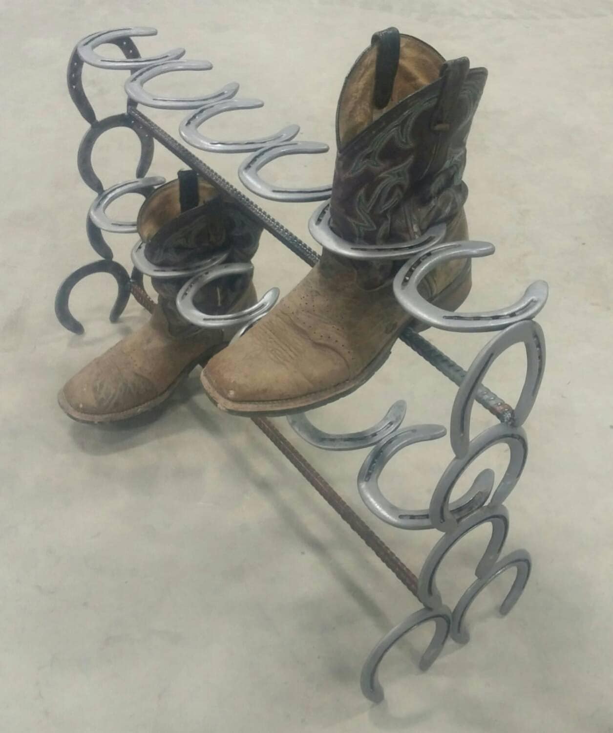 Horseshoe boot rack