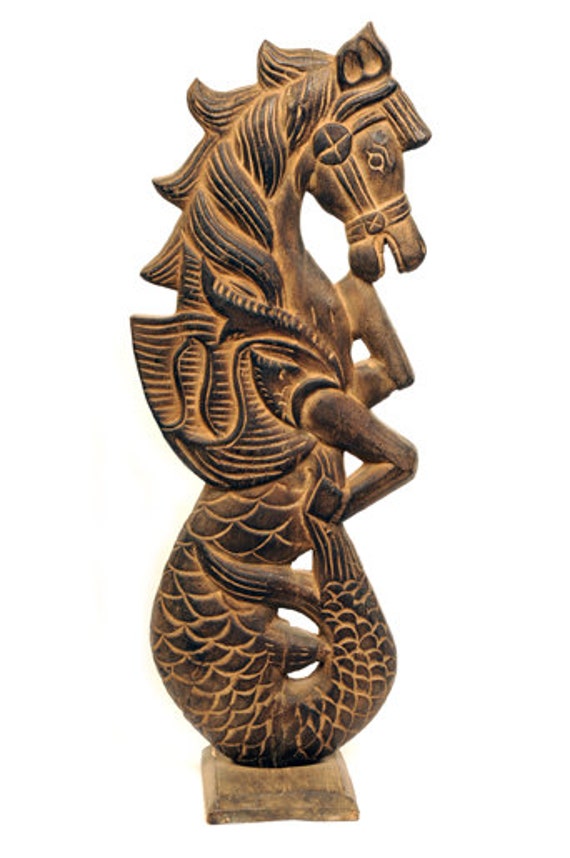 wooden seahorse statue