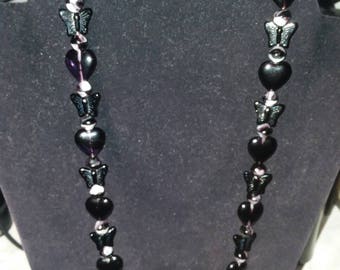 Heart and butterfly necklace.