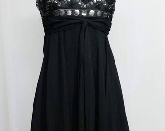 Dress with rhinestones on top