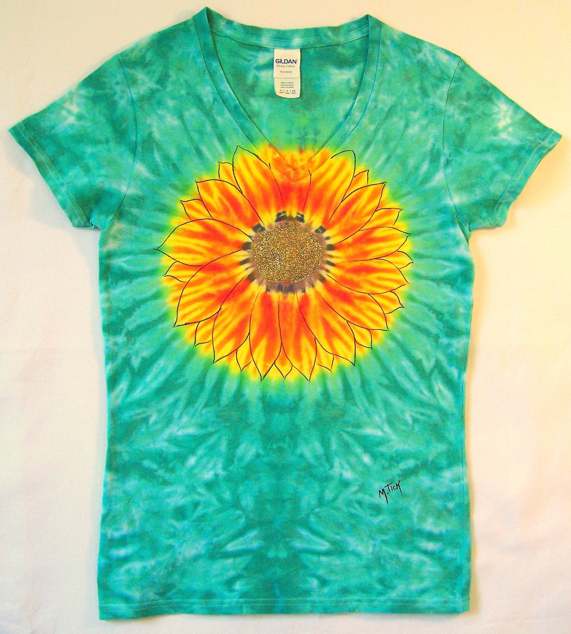 vibrant-sunflower-tie-dye-on-green-ladies-small-tee-ink-and