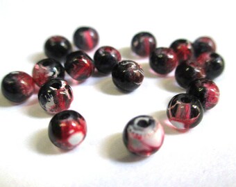 20 black, red translucent 4mm beads
