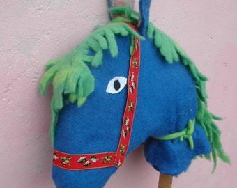 horse in carded wool to ride