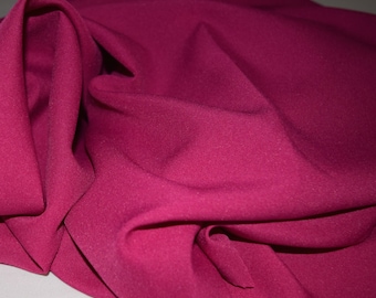 Raspberry or Dark pink 1Gabardine 100% Polyester. Shipping 6.00 first yard all others 1.50. Free swatches available upon request