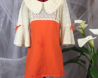 Bell sleeved 1960's lace mini-dress