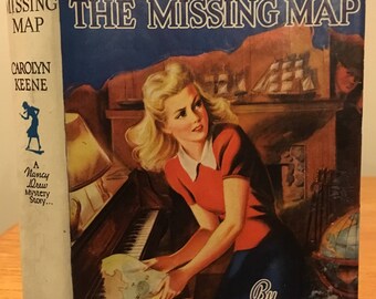 The Quest of the Missing Map - A Nancy Drew Mystery by Carolyn Keene. Early printing in Nice Dust Jacket